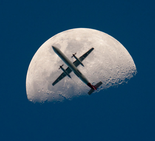 An Airplane Crosses the Moon